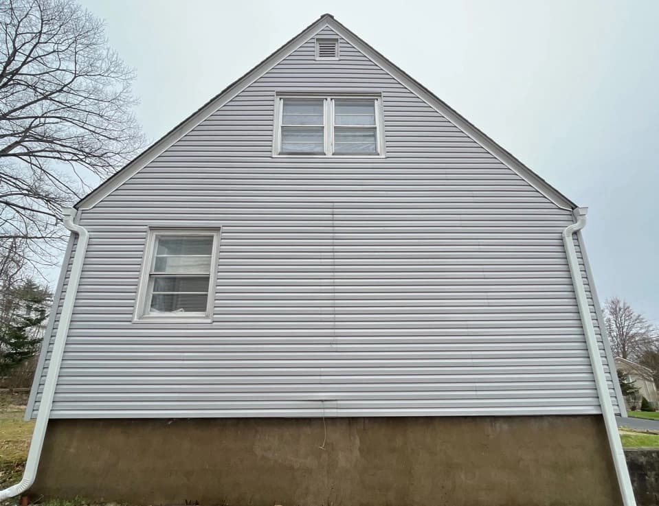 Garfield Heights Power Washing technician performing detailed house washing in Garfield Heights residential area